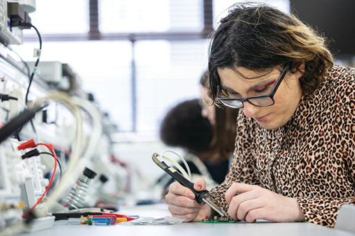 A Kent student works in a computer lab.